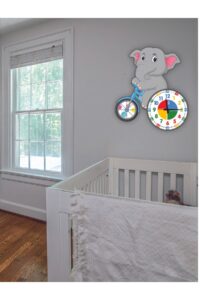 Sevimli Fil Betty Bisiklet Sürüyor Montessori Çocuk Odası Eğitici Ahşap Duvar Saati - Sessiz, Şık Sevimli Fil Betty Bisiklet Sürüyor Montessori Çocuk Odası Eğitici Ahşap Duvar Saati - Sessiz, Şık.