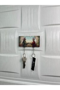 Bahçede Zarif Buluşma Temalı Ahşap Çift Anahtarlık Bahçede Zarif Buluşma Temalı Ahşap Çift Anahtarlık.